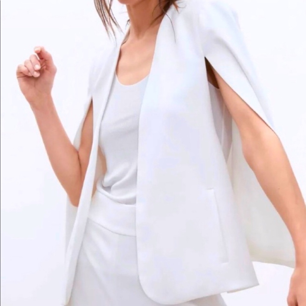White cape. Brand new w/ tags.